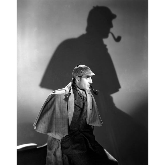 Basil Rathbone as Sherlock Holmes with shadow on wall behind him 24x30 Poster