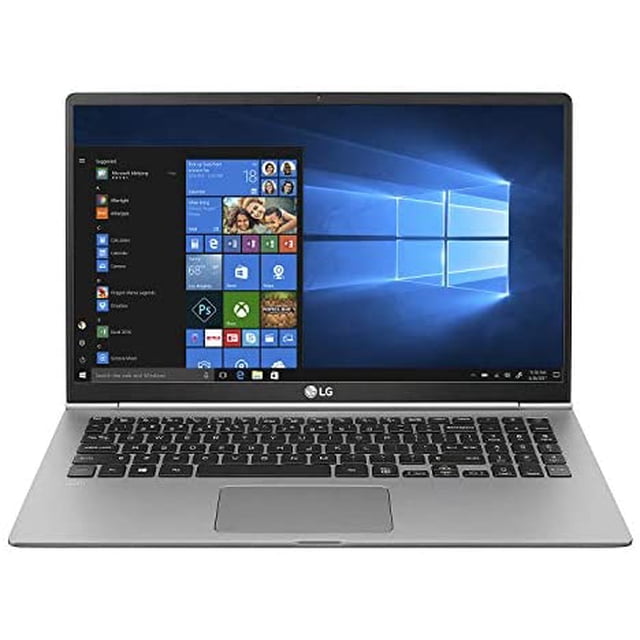 laptop lg i5 8gb ram 256gb ssd 15.6'' windows 10 gen 8 LG gris, vista frontal centrada de 15.6'' con pantalla encendida en Windows 10, teclado completo con teclado numérico y touchpad rectangular, logotipo LG en el bisel inferior y chasis metálico de bordes delgados; diseñada para productividad y multimedia y también frecuentemente usada para edición ligera de fotos.