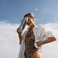 thumbnail image 6 of Mary Lawless Lee x TAL 32oz Stainless Steel 2-in-1 Straw and Chug Water Bottle with Push Lid, Chrome with Blue Ribbed Boot, 6 of 8