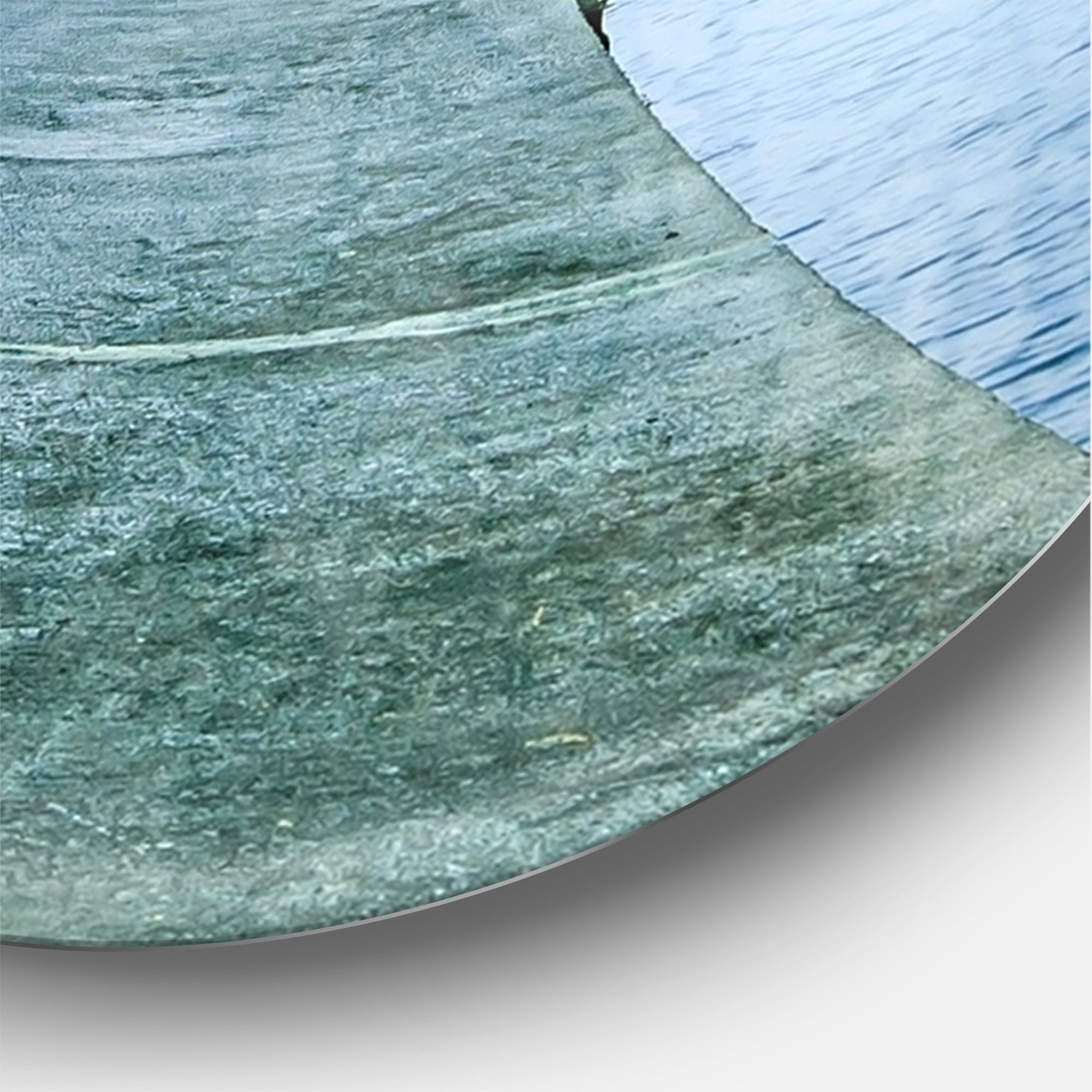 Designart 'Concrete Pier Under Cloudy Sky ' Modern wall clock