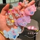 thumbnail image 2 of Nuevo collar luminoso con láser de Sanrio para niños, bonito brazalete colorido con dibujos animados, regalo para niñas, joyería, 2 of 4