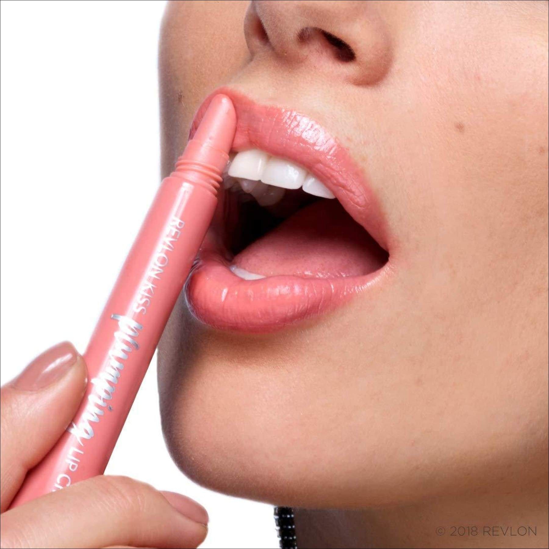 CRÈME À LÈVRES REPULPANTE REVLON KISS™