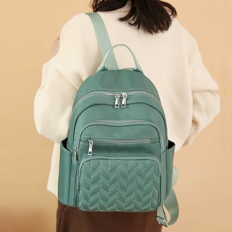 Tiny black best sale backpack