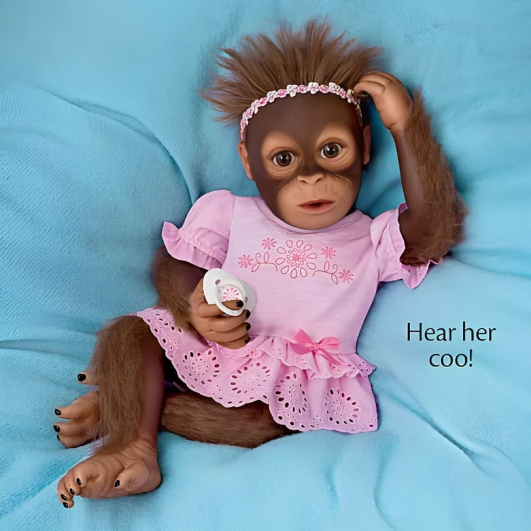 The Ashton - Drake Galleries Cooing Cora Baby Girl Monkey Doll