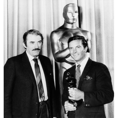 Cliff Robertson Receives A Belated Best Actor Oscar For His Film Charley It As Presented By Gregory Peck