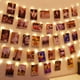 thumbnail image 1 of HXWEIYE Cadena de luz con clips para fotos de 120 LED, luz blanca cálida de 40 pies con 52 clips transparentes, 12 ganchos en el temporizador de pared y 8 modos, cadena de luces de alambre de cobre al, 1 of 7