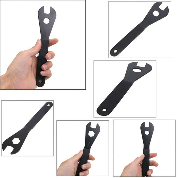 Open clearance head spanner