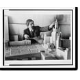 thumbnail image 2 of Historic Framed Print, [Architect Lev Rudnev, leader of group of architects awarded Stalin prize for design of Moscow State University building, with model of the building], 17-7/8" x 21-7/8", 2 of 9