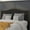 Black, variant on Emma + Oliver Upholstered Full Size Headboard with Nailtrim in White Fabric