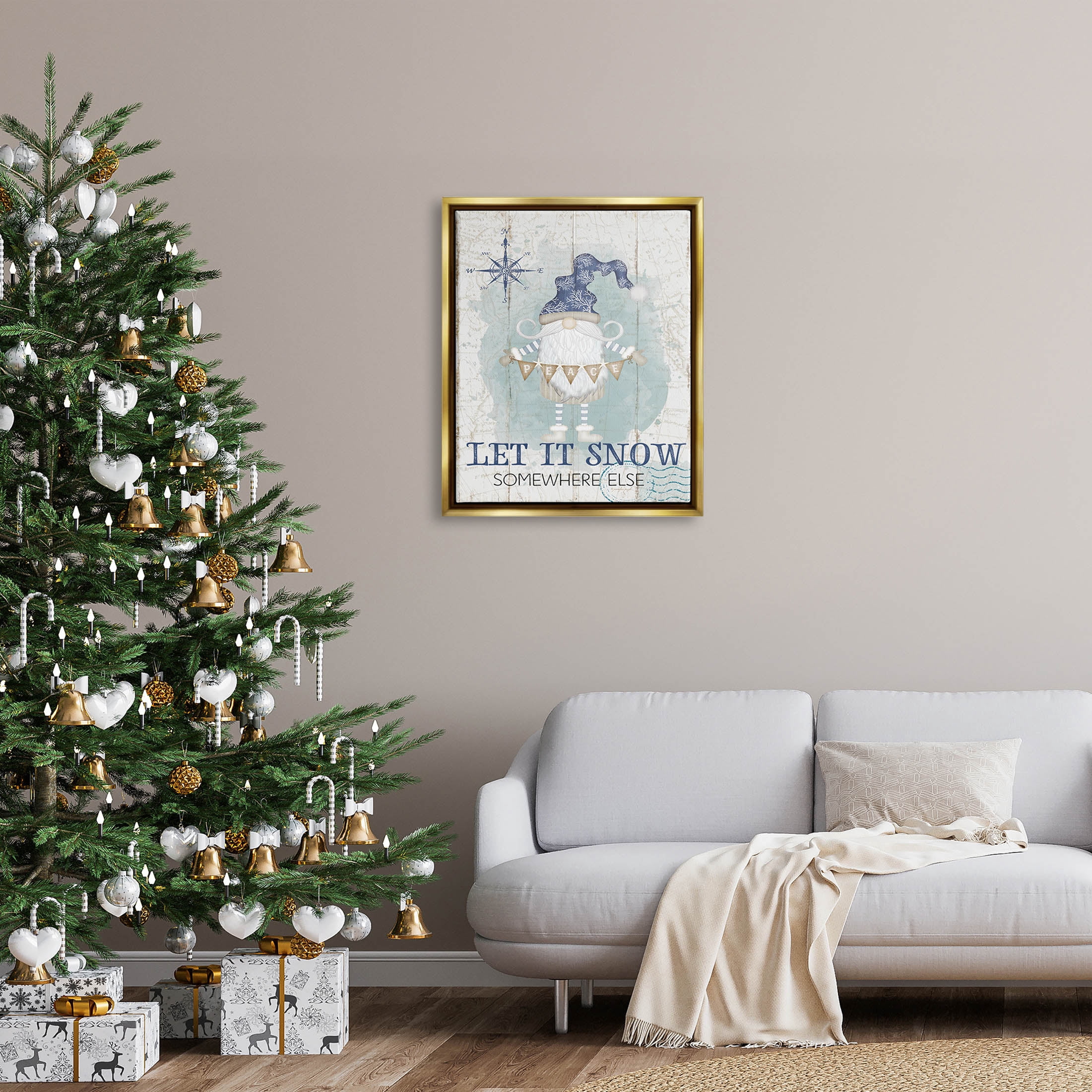 Stupell Industries Let It Snow Somewhere Else Gnome Graphic Art Metallic Gold Floating Framed Canvas Print Wall Art, Design by Jennifer Pugh