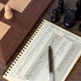 thumbnail image 2 of Juego de 2 cuadernos de ajedrez A&A, 50 partidas grabables, 100 movimientos, 2 of 7