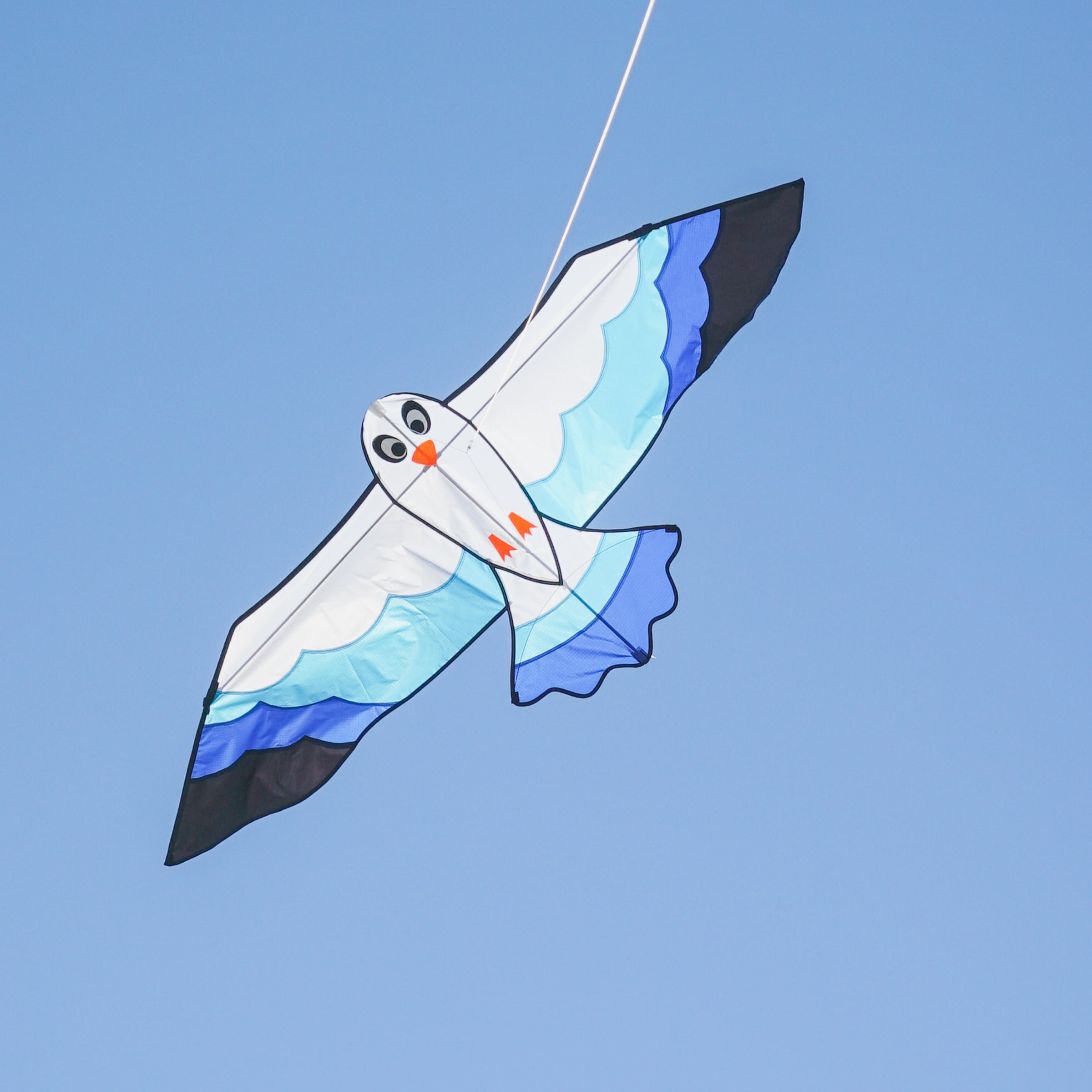In the Breeze 3378 — 70-inch Blue Seabird Kite — Colorful, Easy-Flying, Single-Line Bird Kite; Kite Line Included