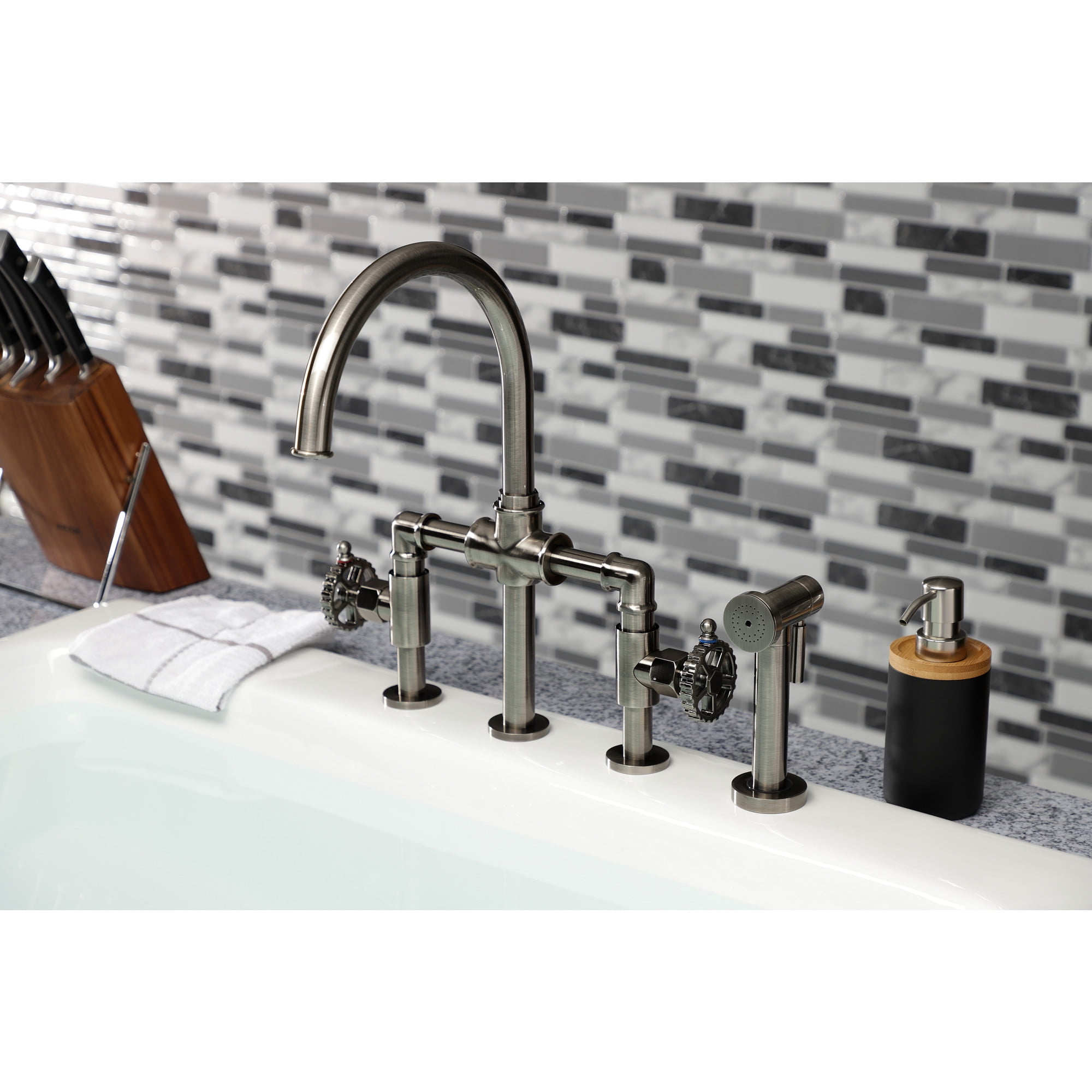 Kingston Brass KS2334CG Fuller Two-Handle 4-Hole Deck Mount Industrial Style Bridge Kitchen Faucet with Brass Side Sprayer in Black Stainless
