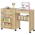thumbnail image 1 of Table Pliante pour Machine à Coudre avec Rangement - Table d'Artisanat en Bois Naturel sur Roulettes pour Salon, Chambre et Bureau - Conception d'Armoire Compacte avec Chevilles et Tablette, 1 of 7