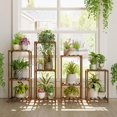 thumbnail image 1 of Soporte para plantas Bamworld, juego de 4 estantes de madera para interior y exterior, 1 of 7