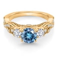 thumbnail image 2 of Gem Stone King 18K Yellow Gold Plated Silver Persian Blue Moissanite White Lab Grown Diamond and White Moissanite Engagement Ring for Women (1.27 Cttw, Gemstone, Round 6MM and 3MM, Size 8), 2 of 4
