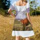 thumbnail image 5 of Una linda vaca con aspecto divertido en un paisaje natural asombroso de las Azores. Vestido morado de manga corta., 5 of 7