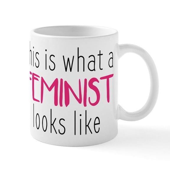CafePress - This Is What A Feminist Looks Li - 11 oz Ceramic Mug - Novelty Coffee Tea Cup