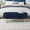 Dark Blue, variant on Noble House Dyani 43" Oval Flannel Storage Ottoman Bench, Upholstered Footrest with Metal Legs, Dark Blue