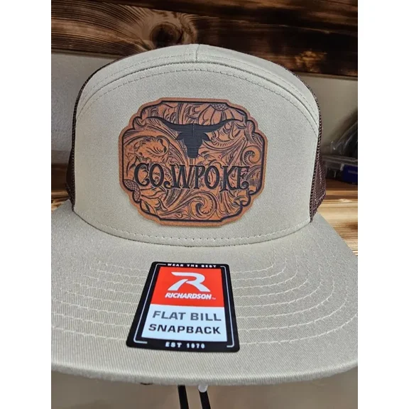 Cowpoke with a tooled-look background leatherette patch on Richardson 112 or 168