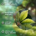 thumbnail image 5 of Vibrant Metal Hanging Wind Spinner with Concentric White Lines & Green Leaf Design Perfect for Yard & Garden Decor, 5 of 6