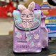 thumbnail image 5 of Mochila escolar australiana genuina Smiggle con forma de conejo ángel morado, mochila mediana para niños, taza de agua, estuche retráctil para bolígrafos, regalo para estudiantes, 5 of 5
