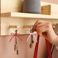 thumbnail image 5 of Uxcell 4 Pcs Bow Keychains PU Leather Key Chain Hanging Accessories Pendant Keychain Clip for Women Car Key Phone Charm Purse Bag Backpack Hanging Decorations, Beige, 5 of 6