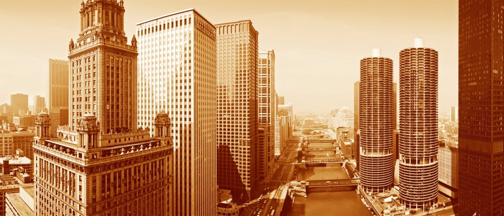 This is a sepiatone view looking over the Chicago River The Marina Tower Apartments the Wrigley Building and the skyline surround the river It is a black and white shot Canvas Art - Panoramic Images (