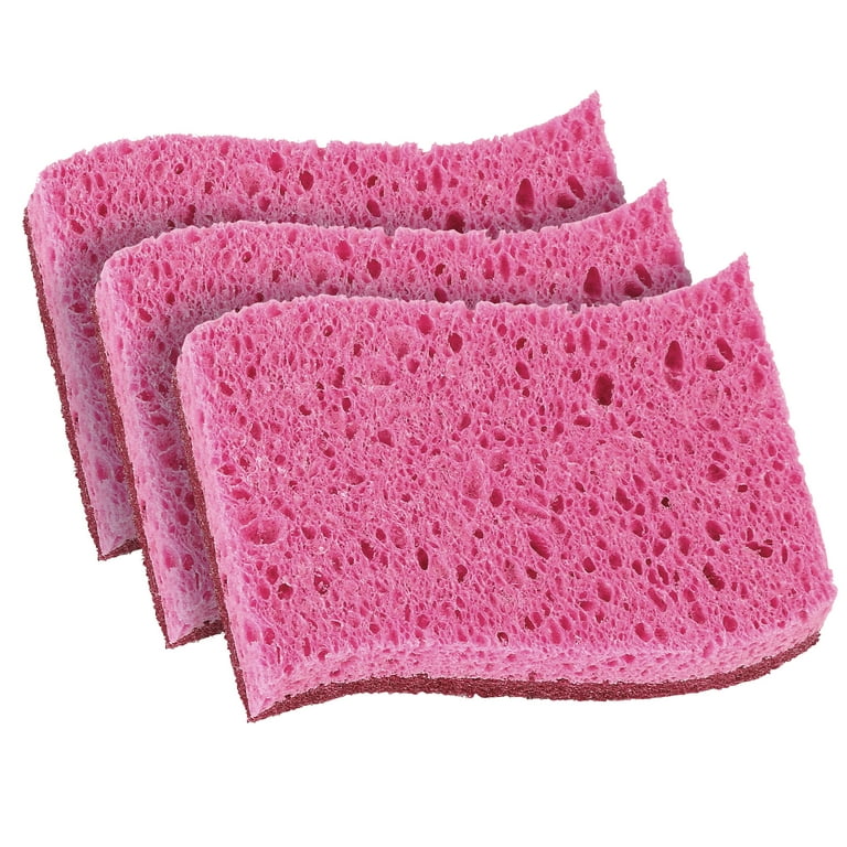 Plain blue and pink polyurethane kitchen sponges, A pile of…