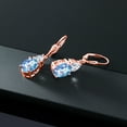 thumbnail image 4 of Gem Stone King 18K Rose Gold Plated Silver Millennium Blue Mystic Quartz and White Moissanite Dangle Earrings for Women (6.94 Cttw, Gemstone Birthstone, Oval 10X8MM, Trillion 5MM), 4 of 4