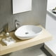 thumbnail image 2 of Lavabo de ceramica ovalado sin rebosadero sobre cubierta marca Gravita, 2 of 5