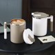 thumbnail image 1 of Taza Taza beige de acero inoxidable con doble pared aislante,tapa y asa,ideal para viajes,oficina y camping (1 unidad). Rkxzt, 1 of 9