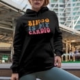 thumbnail image 2 of Bingo Is My Cardio, Witty Workout & Game Humor Quote, Groovy Retro Wavy Text Merch Gift, Black Hooded Sweatshirt or Hoodie, XL, 2 of 5