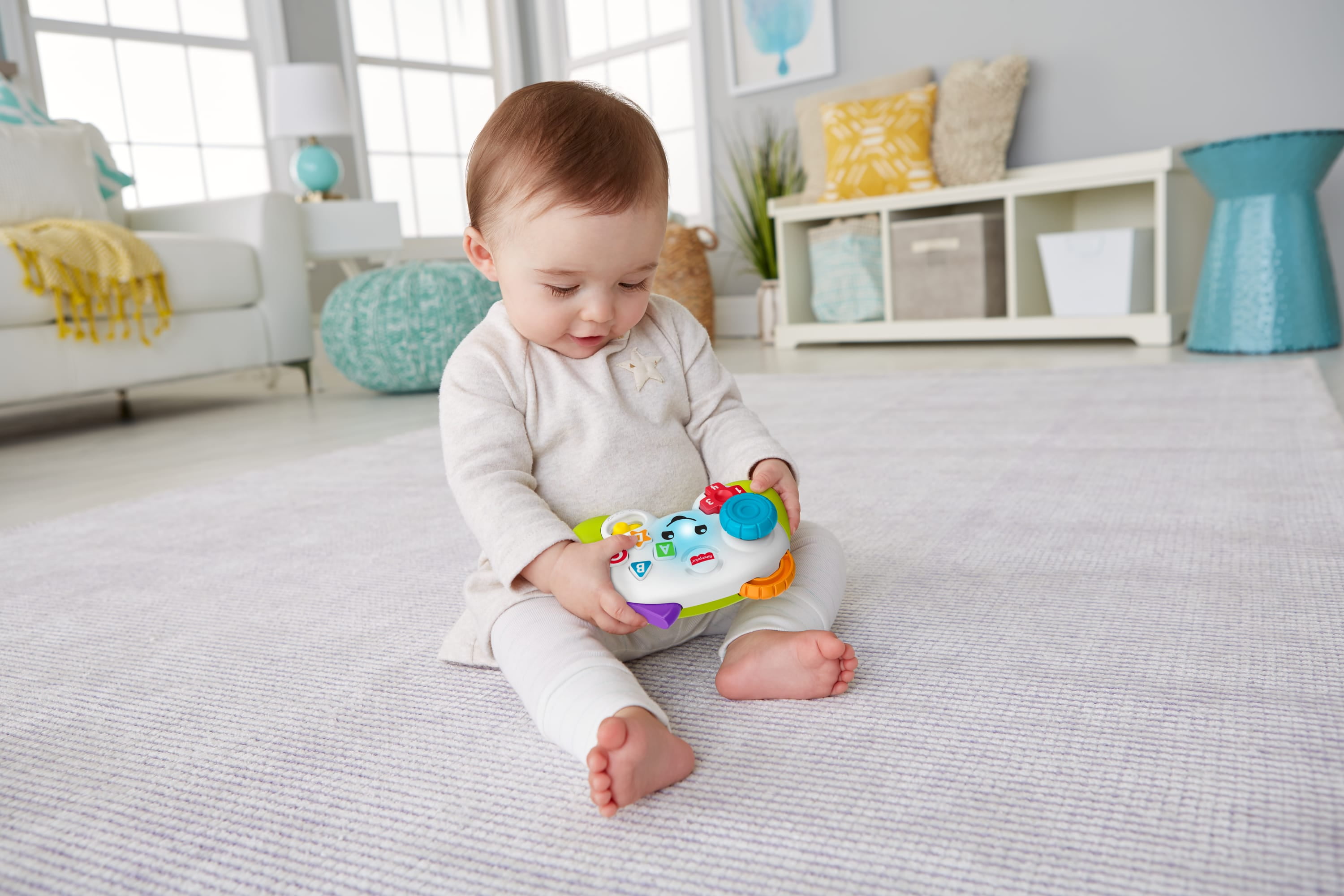 Fisher-Price Laugh & Learn Game & Learn Controller Musical Baby Toy with Lights, Multilanguage Version, Pretend video game controller learning toy for babies and toddlers with 2 musical play modes: Learning and Play