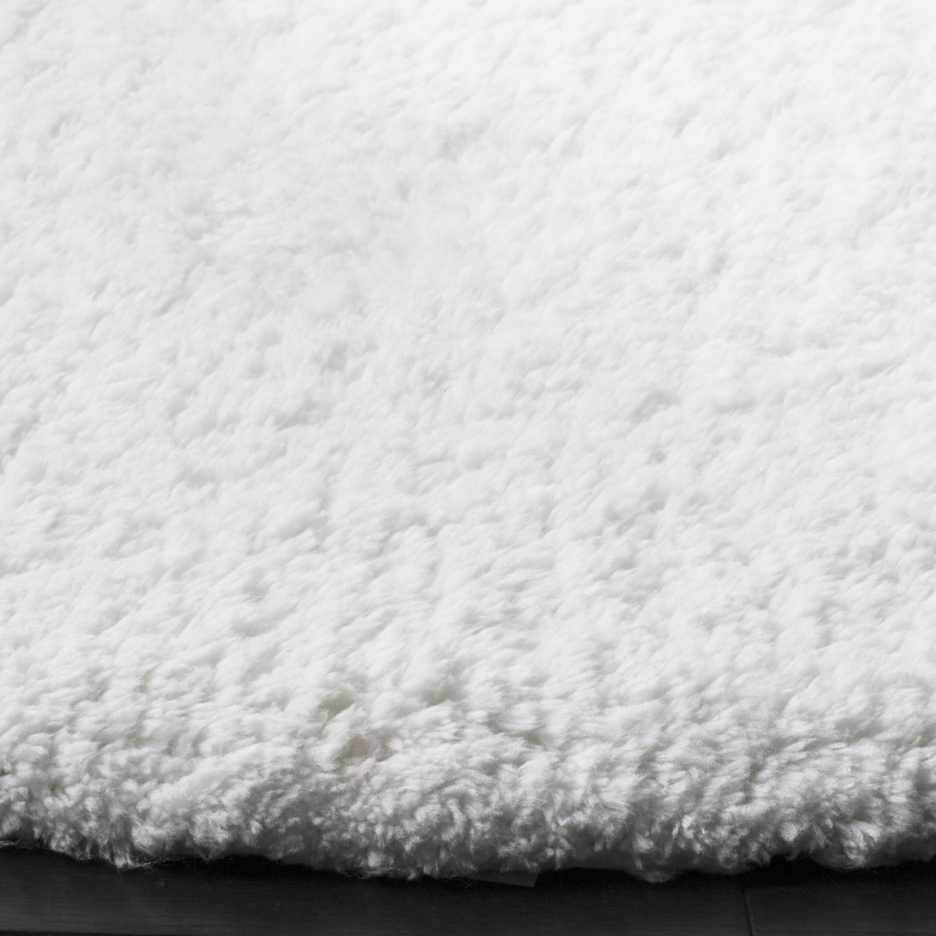 SAFAVIEH Sybella Solid Plush Polyester Sheep Shag Area Rug, Ivory, 6' x 9'