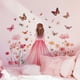 thumbnail image 1 of Adhesivo de pared creativo con dibujos animados de niña con flores y mariposas, 1 of 4