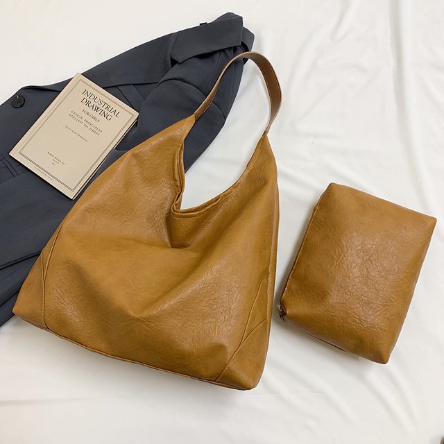 Bolso de mano sencillo para madre e hijo de tendencia retro 2025, nueva versión coreana, bolso de axila de gran capacidad, bolso de hombro de nicho de alto valor