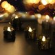 thumbnail image 4 of CHAO Paquete de 12 velas LED (negras), velas de té sin llama, velas eléctricas parpadeantes, decoración ambiental interior y exterior para Halloween, bodas, fiestas (3), 4 of 5