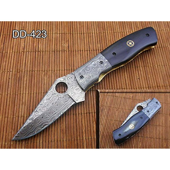 7.5" folding knife Damascus steel blade with finger hole, Natural Bull horn scale with Damascus Bolster, Equipped with Liner lock, comes with Cow hide Leather sheath