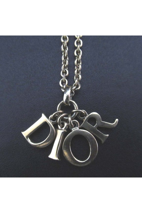 Pre-Owned Vintage Christian Dior logo charm necklace pendant in GP gold for women.