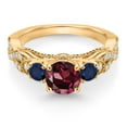 thumbnail image 2 of Gem Stone King 18K Yellow Gold Plated Silver Red Rhodolite Garnet Blue Sapphire and White Moissanite Engagement Ring for Women (1.57 Cttw, Gemstone January Birthstone, Round 6MM and 3MM, Size 7), 2 of 4