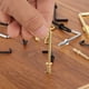 thumbnail image 5 of Paquete de 40 Ganchos en L, Ganchos de Tornillo de Ángulo Recto de 5/8 Pulgadas para Colgar, Negro, 5 of 7