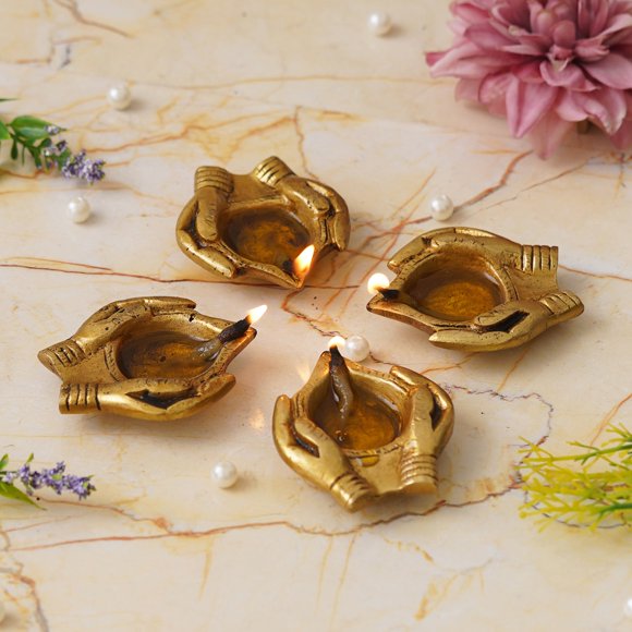 Set Of 4 Lady Hand Holding Brass Diyas | Ethnic Designer Golden Handcrafted Brass Diyas