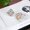 Gold, variant on Women's Gold Dazzlers Cubic Zirconia Diamond Frame Stud Earrings by Howard's