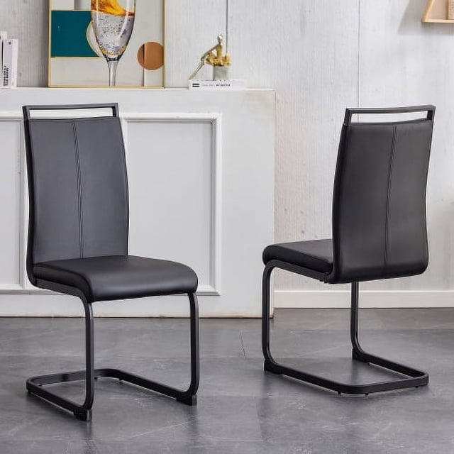 Noble House A set of 2 black PU leather dining chairs: black metal frame