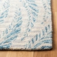 thumbnail image 3 of SAFAVIEH Micro-Loop Daffodil Leaves Area Rug, Ivory/Blue, 5' x 5' Square, 3 of 10
