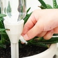 thumbnail image 3 of Muyoka Dispositivos de riego de plantas Sistema automático de riego de plantas Plantas de agua con interruptor de válvula de control de liberación lenta Soporte anti-inclinación hacia abajo Plantas de Muyoka Hogar, 3 of 5