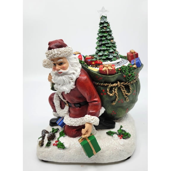 7.25 inch LED Kneeling Santa Figurine with Toy Sack and Rotating Train, Christmas Red and Green, Resin