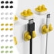 thumbnail image 1 of Pack de 6 clips para cable • Organizador de gestión de cables de sobremesa • Abrazaderas para cables de carga y datos • Portacables adhesivos (negro, blanco, gris, verde, amarillo), 1 of 6