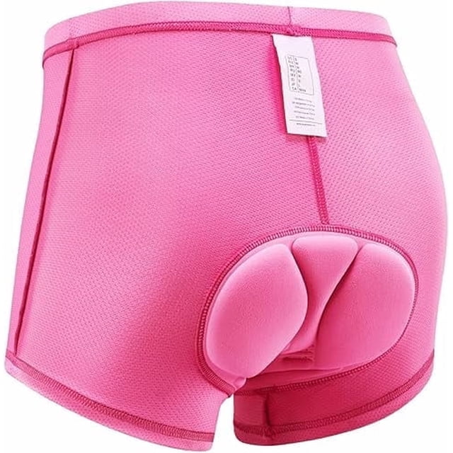 qualidyne ropa interior de bicicleta acolchada 4d para mujer rosa, vista trasera 3/4 de shorts liner ajustados con tejido de punto elástico y paneles de malla contrastantes, costuras flatlock visibles y pretina elástica; almohadilla de gamuza con gel 4D centrada para amortiguar el hueso del asiento y reducir la fricción. Apto como capa base para ciclismo de carretera, montaña y paseos; también suele usarse como forro cómodo para entrenamientos en bicicleta cortos.